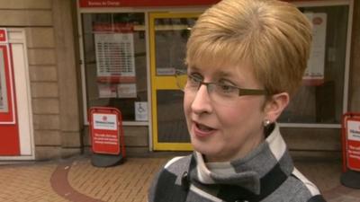 Shopper stockpiling stamps in Birmingham