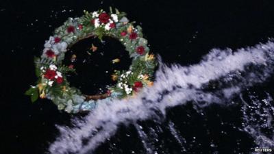 Wreath floating in MS Balmoral's wash