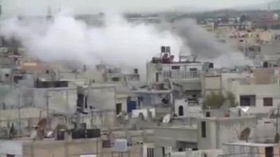 Smoke from buildings in Homs