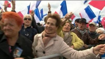 French people wave flags