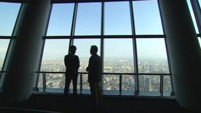 Roland Buerk standing in Tokyo's Skytree
