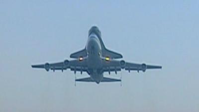 The shuttle Discovery bolted on top of a jumbo jet