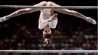 Gymnast Nadia Comaneci scores a perfect 10 in 1976 Montreal Olympics