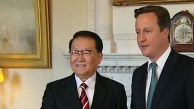 Prime Minister David Cameron and Chinese politburo member Li Changchun