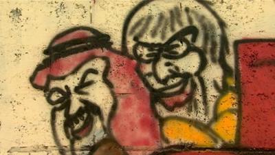 Graffiti of Bahrain's King Hamad and F1 boss Bernie Ecclestone