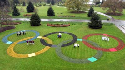 Olympic rings made up of flowers