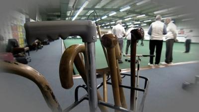 Walking sticks at bowling club