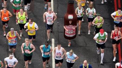 Runners cross Tower Bridge