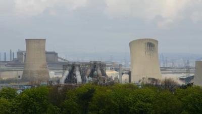 The two cooling towers and concrete stack were brought down in a controlled demolition