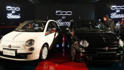 Two Fiat cars, co-designed with fashion house Gucci, on display in Beijing, China