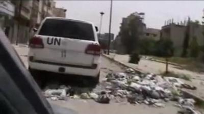 Video purporting to show UN monitors touring a devastated Homs neighbourhood on April 28