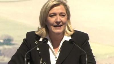 National Front leader Marine Le Pen addresses a rally on May Day