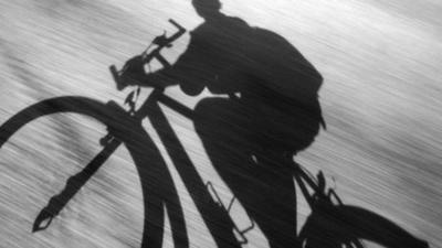 Shadow of cyclist