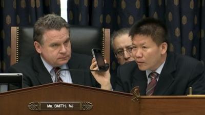 Chen Guangcheng speaks by phone to a Congressional hearing