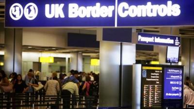 Border control in Terminal 5 of London's Heathrow airport