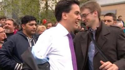 Ed Miliband's jacket is hit by an egg