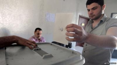 Voter in Syria