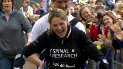 Claire Lomas finishing her marathon on crutches