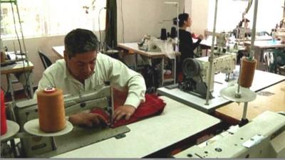 Alvaro Perez in his sewing machine