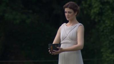 An actress playing a "high priestess" at the Olympic torch lighting ceremony in Greece