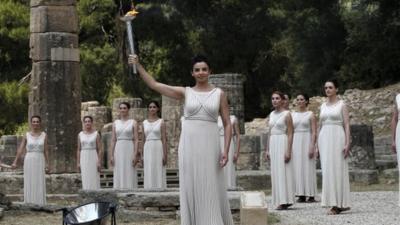 Actresses perform during ceremony to light Olympic flame