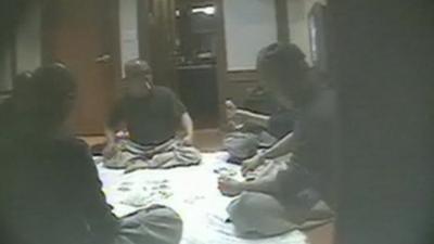 Video footage shows some monks gambling