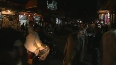 Street in Islamabad plunged into near-darkness by power cut