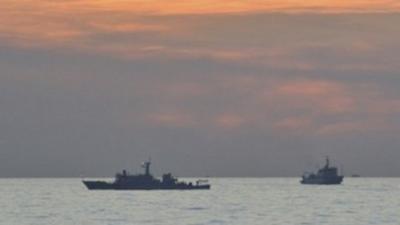 Two Chinese surveillance ships near the Scarborough Shoal on 10 April, in image via Philippine military