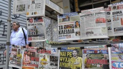 Newspapers at a kiosk in Athens, Greece