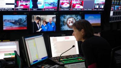 A TV director in a production gallery