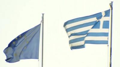 Greek and EU flags