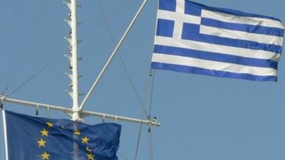 Greek and European flags flying together