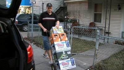 Man buying crates of beer in Quebec