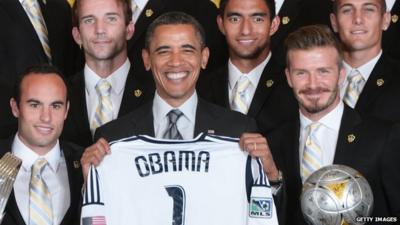 President Obama poses with David Beckham