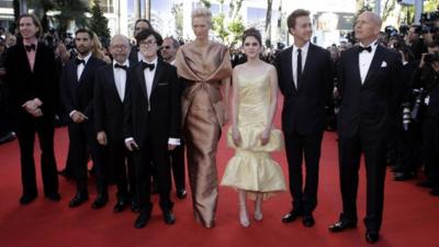 Cast members of Moonrise Kingdom, from left, Director Wes Anderson, Jason Schwartzman, Bob Balaban, Jared Gilman, Tilda Swinton, Kara Hayward, Edward Norton and Bruce Willis arrive for the opening ceremony and screening of Moonrise Kingdom at the 65th international film festival in Cannes