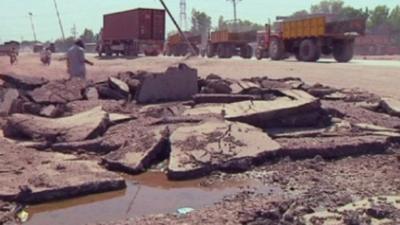 The Peshawar ring road damaged by Nato supply trucks