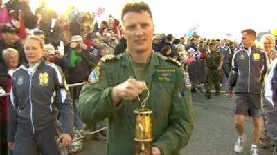 Olympic flame is carried through streets of Land's End