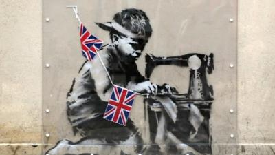 Mural on Wood Green High Road, London, by the artist Banksy