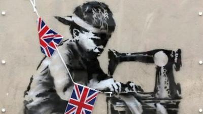 Mural on Wood Green High Road, London, by the artist Banksy