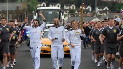 Muse with the Olympic torch