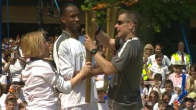 Chelsea striker Didier Drogba with the Olympic torch