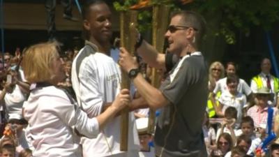 Chelsea striker Didier Drogba with the Olympic torch