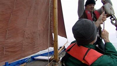 Men in a replica of a Skaffie