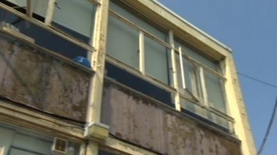 Exterior of dilapidated school