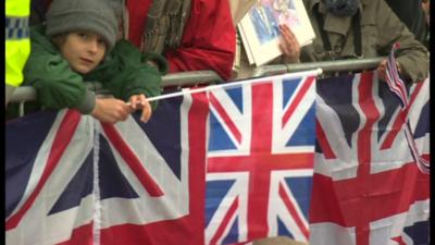 A child holding the Union Jack