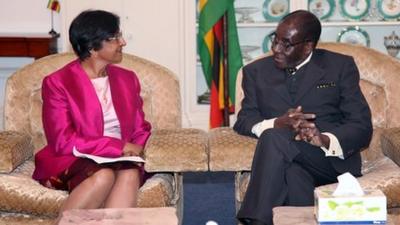 United Nations High Commissioner for Human Rights Navi Pillay, left, meets Zimbabwean President Robert Mugabe