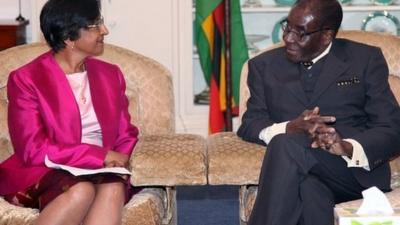 United Nations High Commissioner for Human Rights Navi Pillay, left, meets Zimbabwean President Robert Mugabe