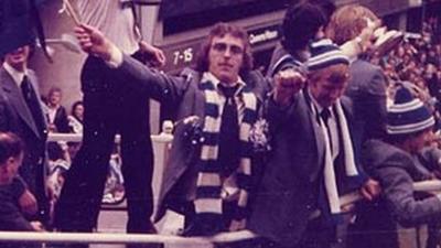 FA Cup winner Kevin Beattie waves a flag at Ipswich homecoming parade, photo by C Heal