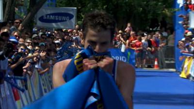 Britain's Jonathan Brownlee celebrates victory in Madrid