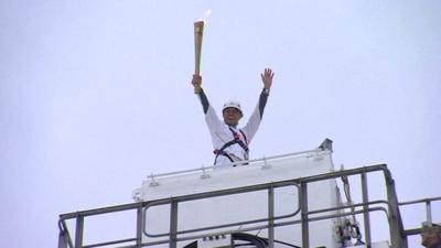 John Bishop at the top of the Lovell Telescope